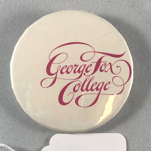A button with the words 'George Fox College' written in cursive