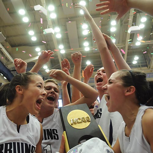 Womans basketball team with trophy