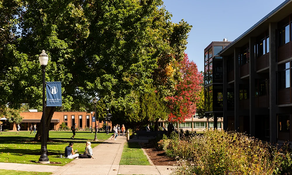 Trees and students on George Fox campus