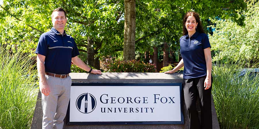Faculty Standing at George Fox Entrance