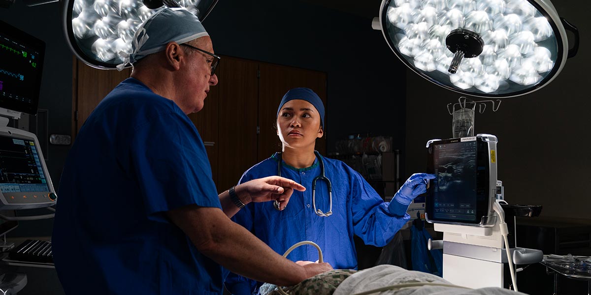 Bill Prosser working on a patient