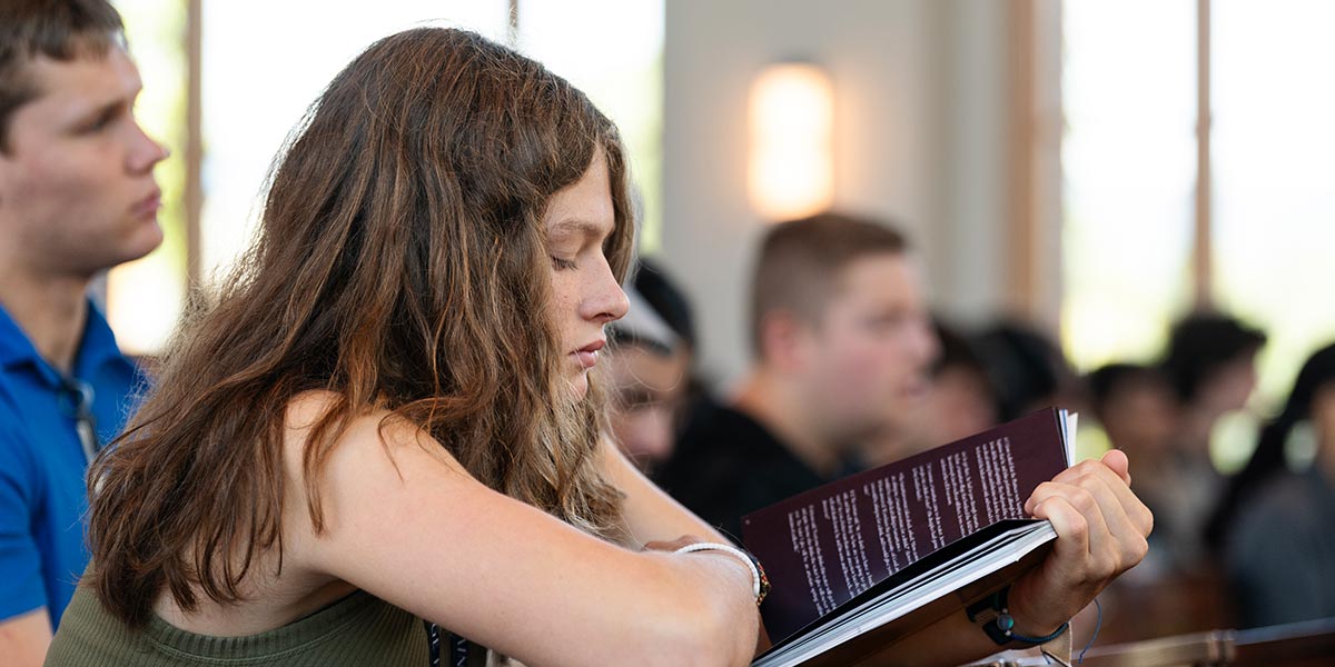 Student with liturgy book