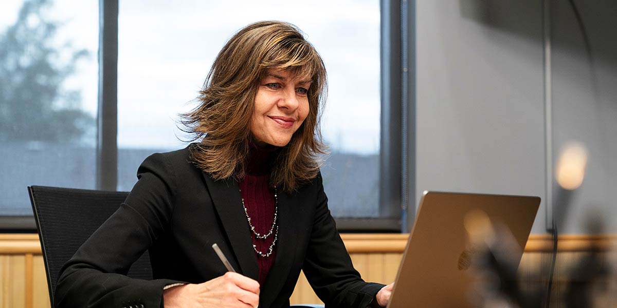 Beth Bering with her computer