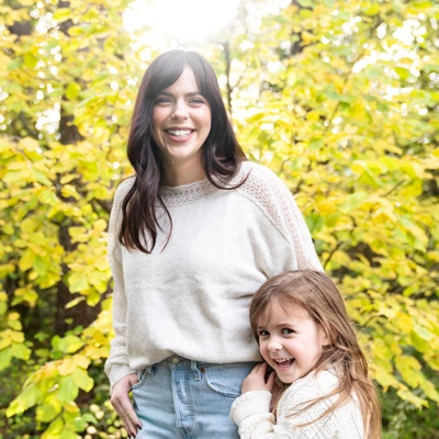 Esther Davido and her daughter smiling