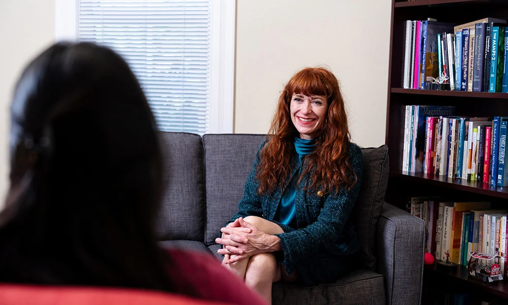 April Philips talking to a patient