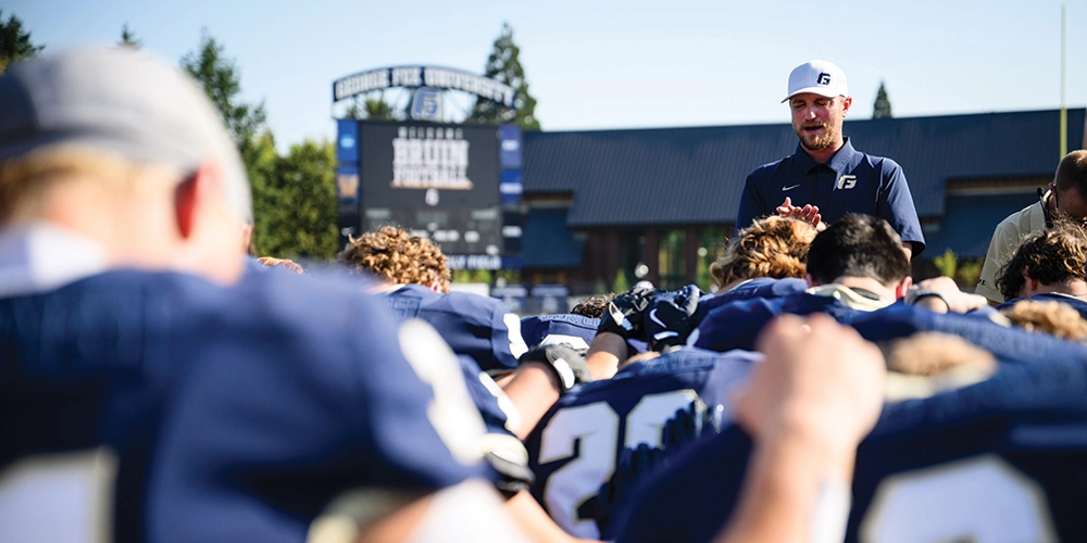 Players praying on the football field