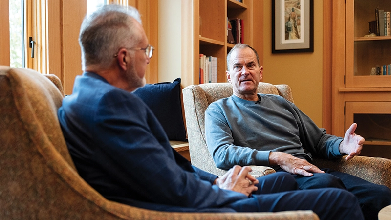 President Baker and Tim Davis talking