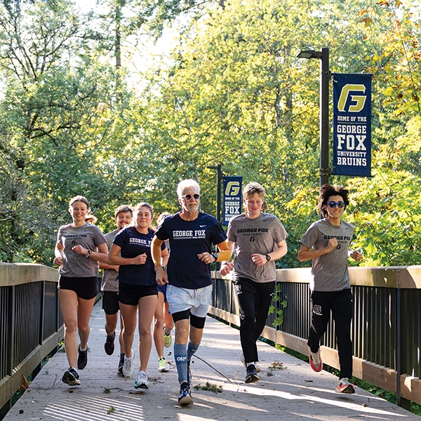 President Robin Baker and students running