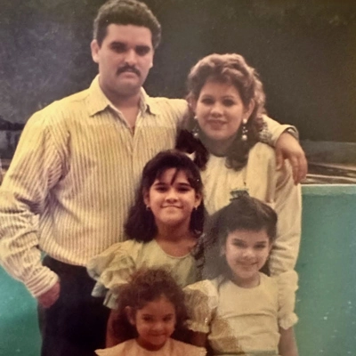 Nathalie Angulo as a child with her family