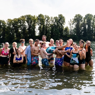students swimming at the Willamette River