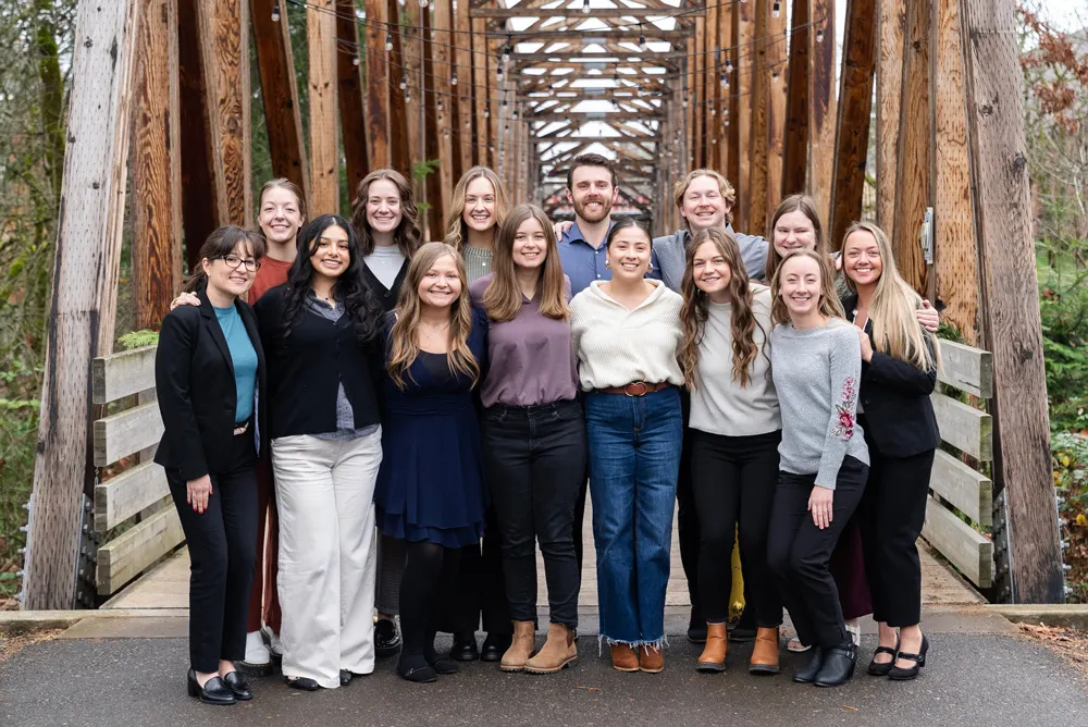 Schroeder stands with her cohort at George Fox