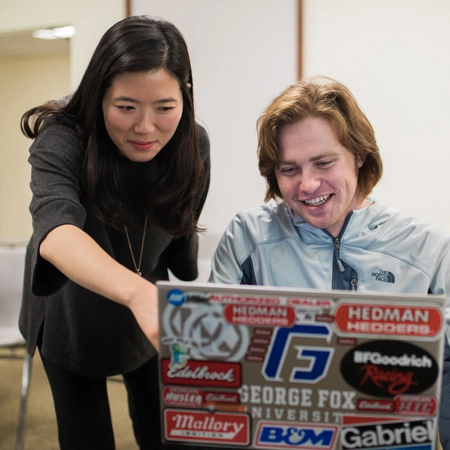 students working at a computer