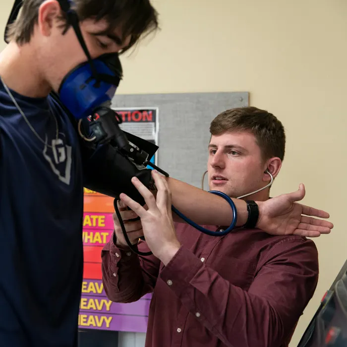 Student takes another's heart rate