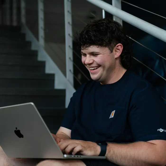 Student works on a laptop