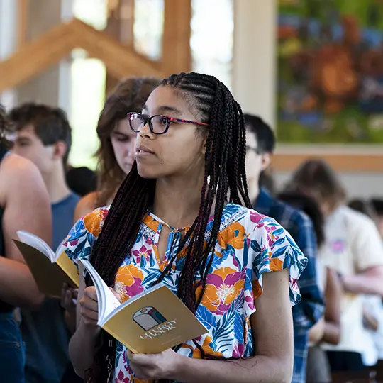 Student with liturgy book