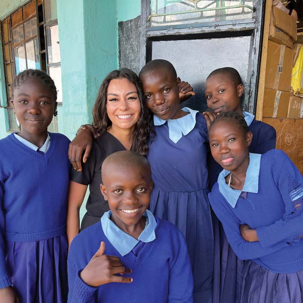 Gonzalez smiles with Kenyan girls