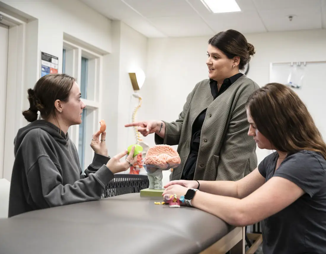 Professor engaging with a student
