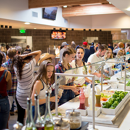 Students in line at the salad bar in the dining hall