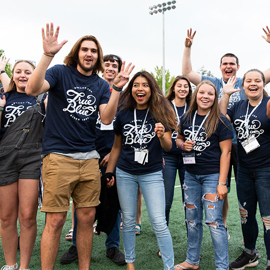 A group of happy students at the Welcome Weekend event