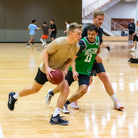 Students playing basketball