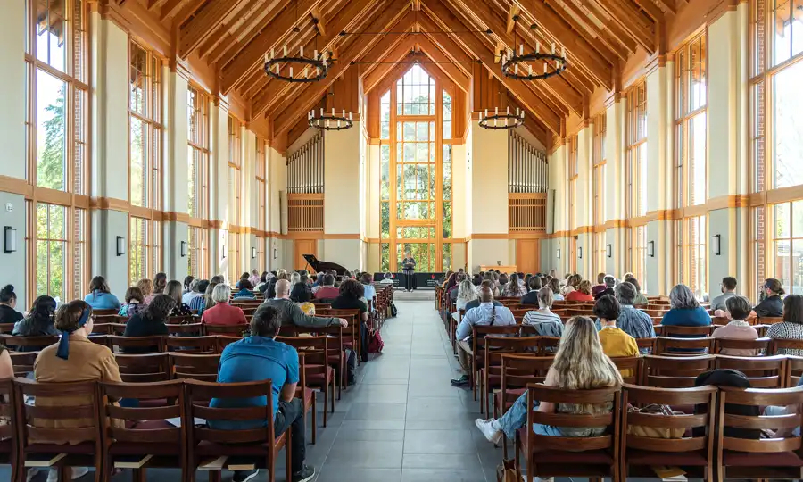 Seminary students sitting in the George Fox chapel