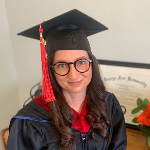 portrait of Carissa in graduation cap and gown