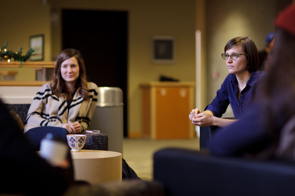 MSW students sit together in a building at George Fox